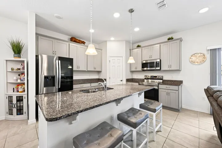 The center island offers extra prep space and has room for counter-height seating.