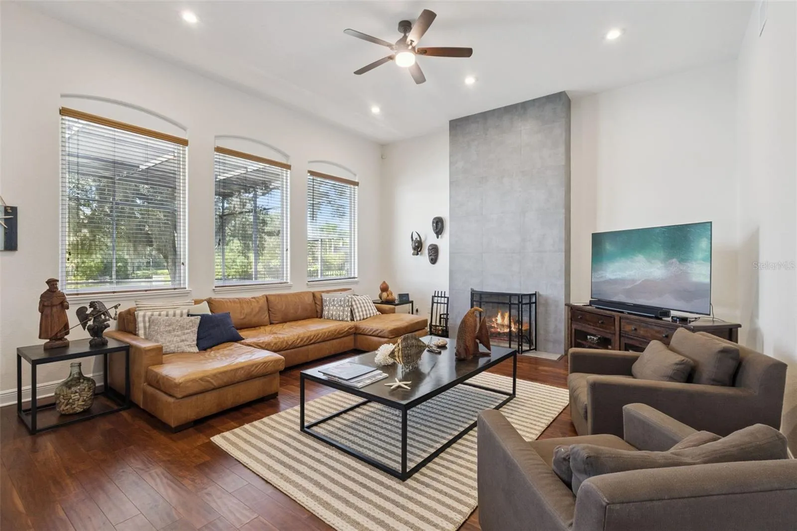 Family room with warming fireplace.