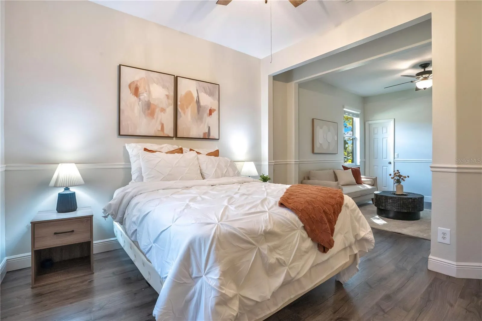 Bedroom opens to an adjoining sitting room.
