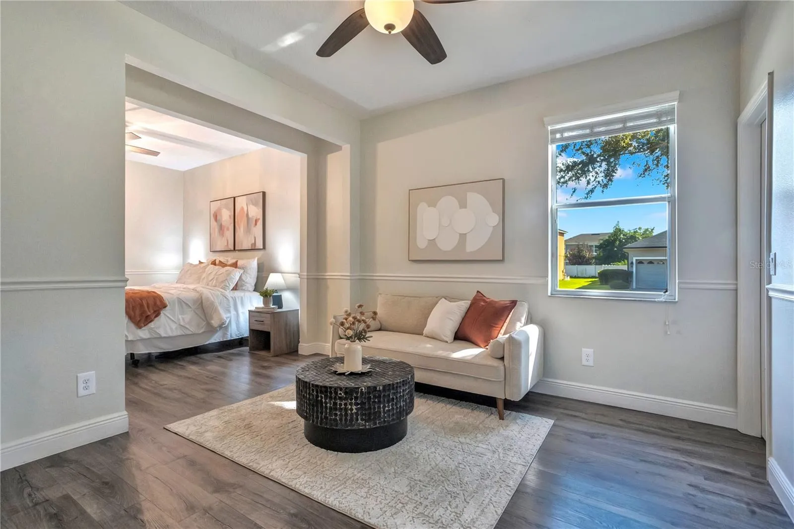 Suite layout with bedroom and sitting room.