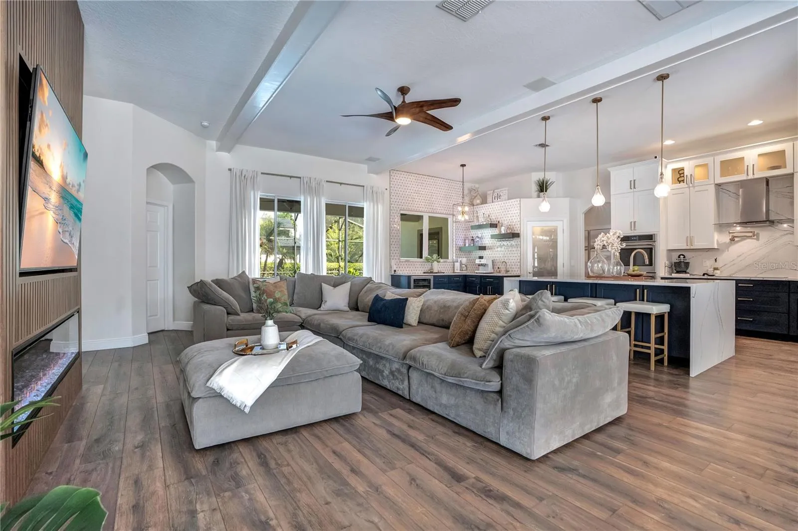Spacious living room open to the kitchen.