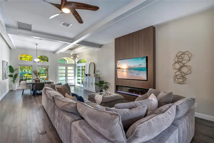 Living room with views to the dining room and foyer.