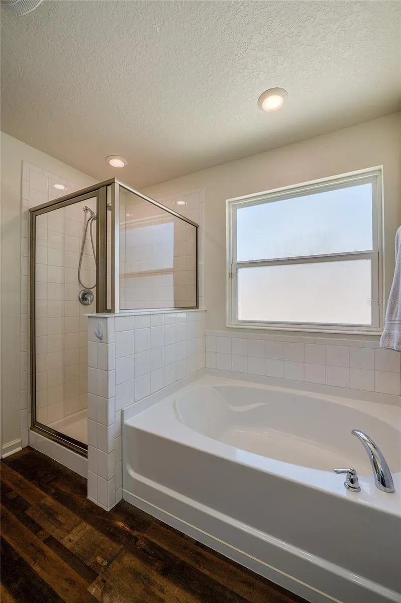 Tub with separate shower