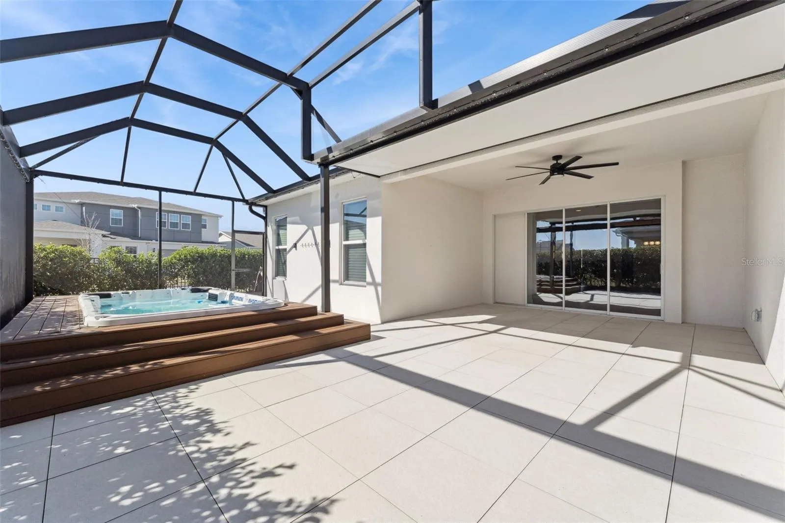 Expansive screened lanai offering plenty of outdoor living space.