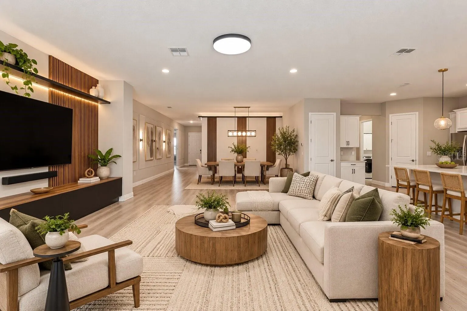 Virtually Staged! Spacious living room with open-concept design.