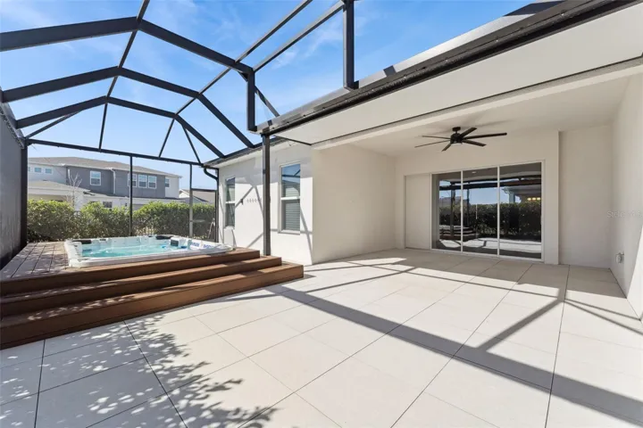Expansive screened lanai offering plenty of outdoor living space.
