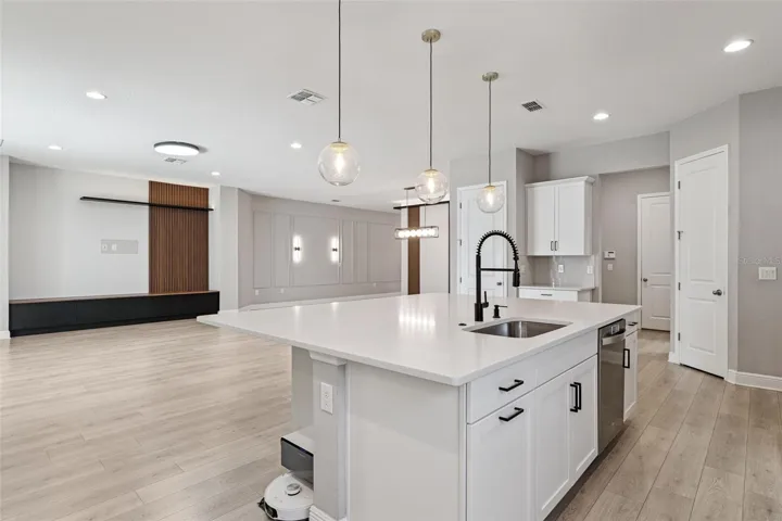 Modern kitchen with abundant cabinetry, counter space, and natural light.