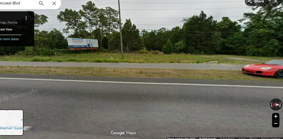 Billboard in front of property on US 19