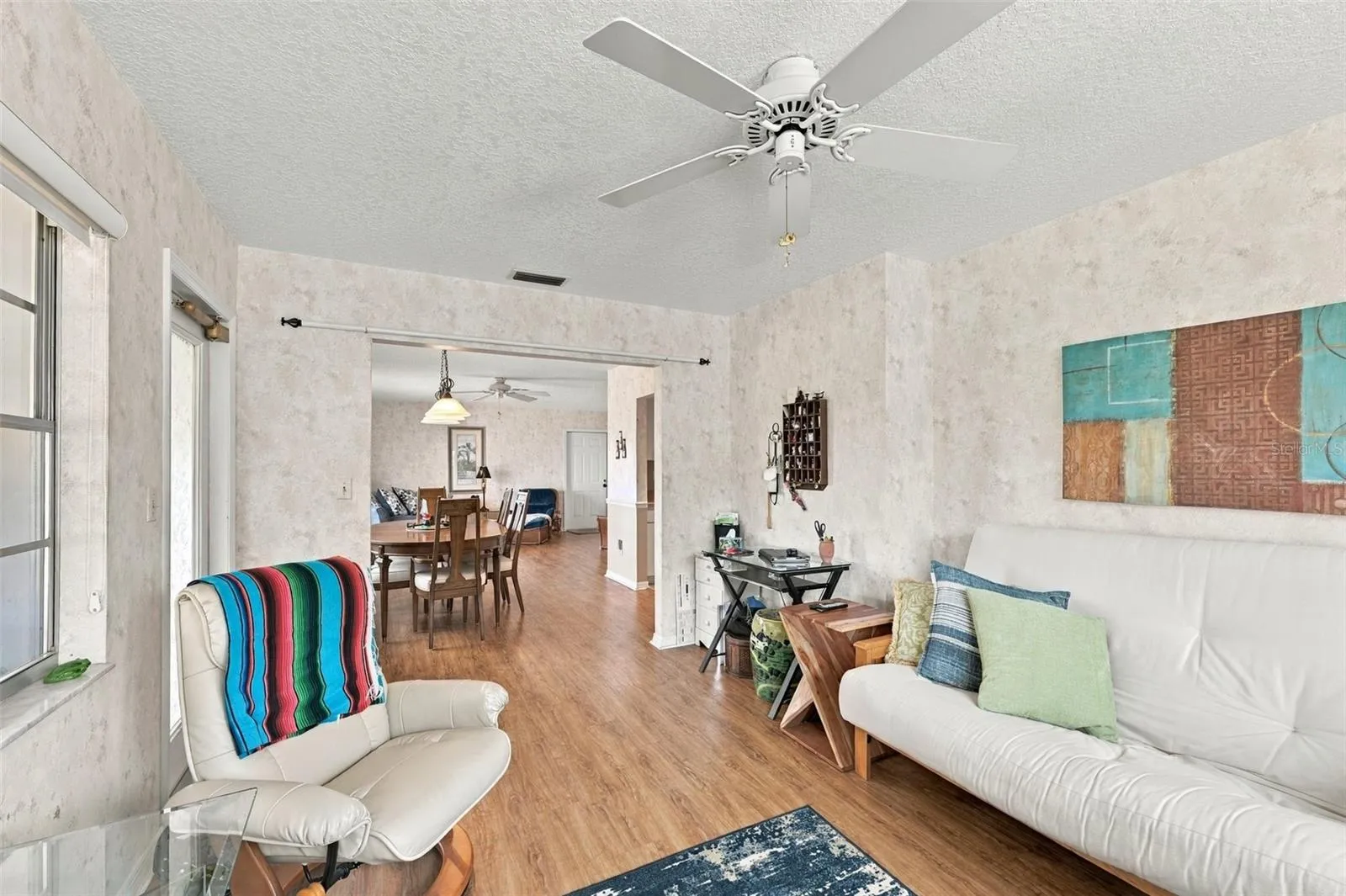 Tones are muted with a more natural feeling throughout the home.