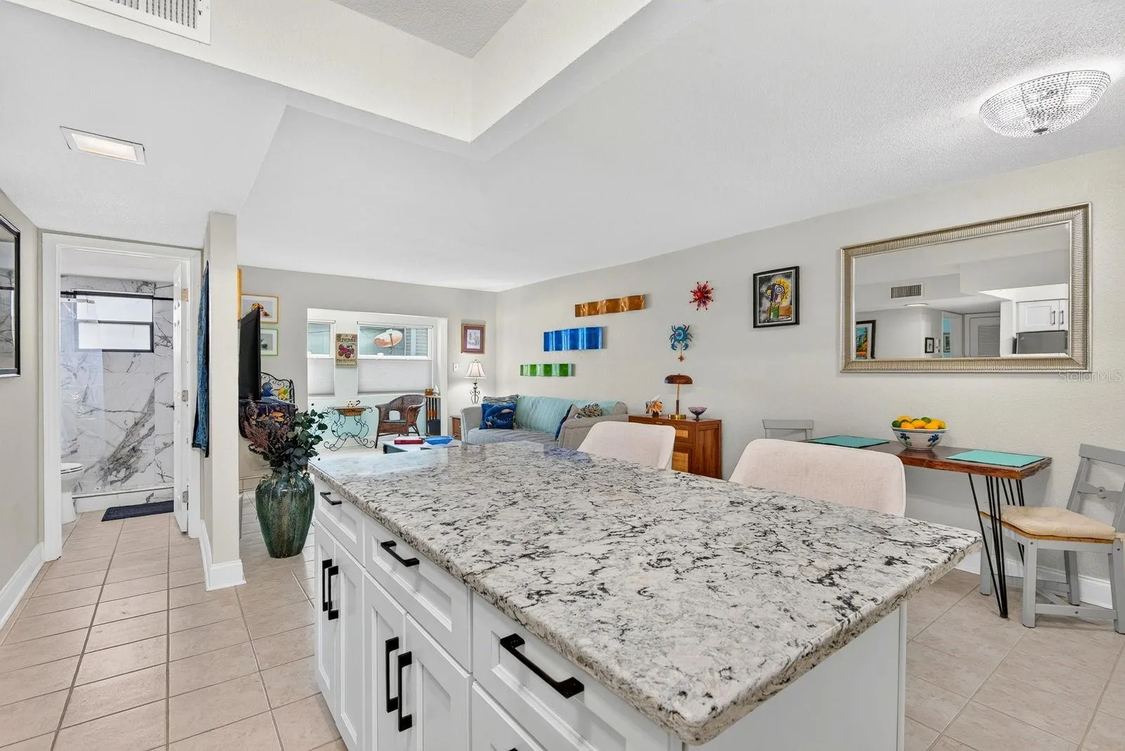 Kitchen area facing into living room