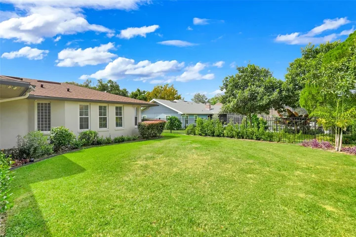 Enclosed ornamental fenced backyard