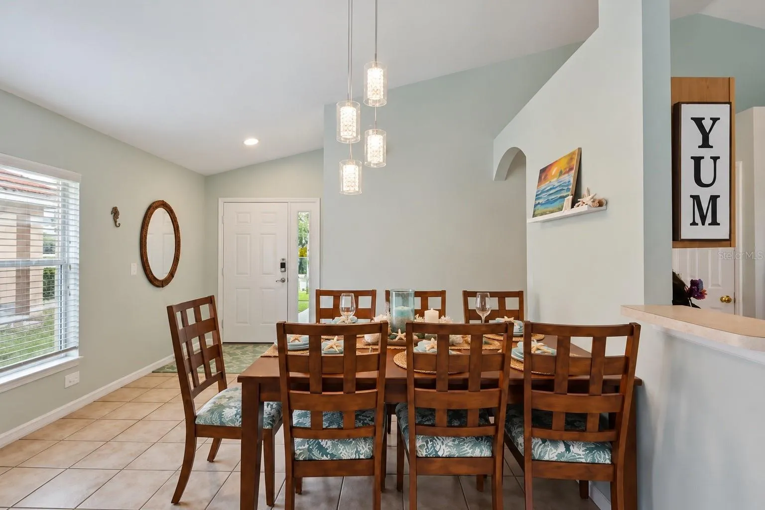 looking at dining space towards front entry