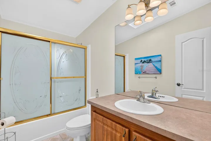 Guest Bathroom with vanity and tub