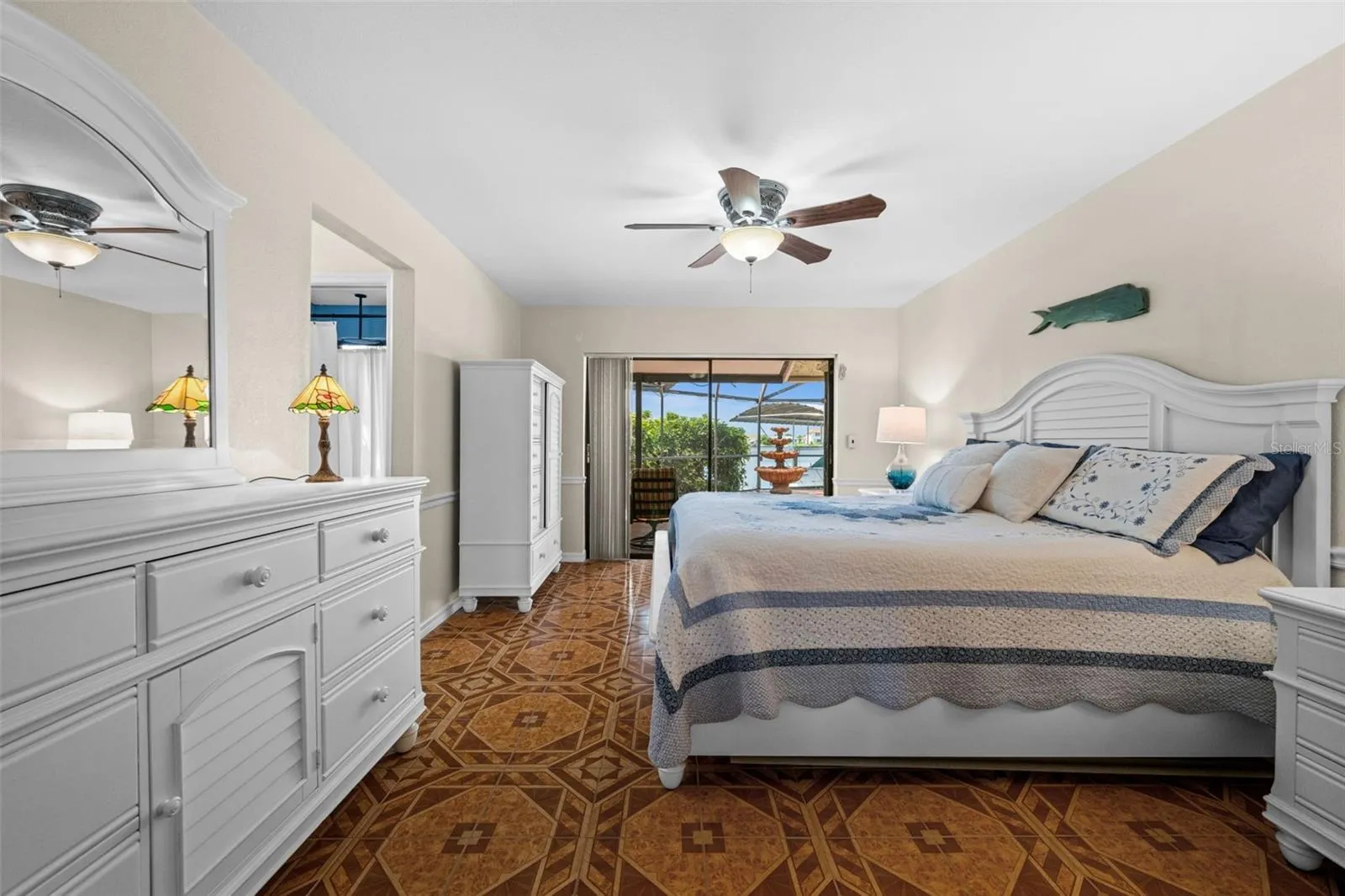 Generously sized primary suite with walk-in closet