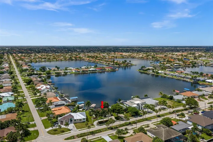 Welcome to 5028 Pelican Blvd with Amazing Long Lake Views over the famous 8 Lakes