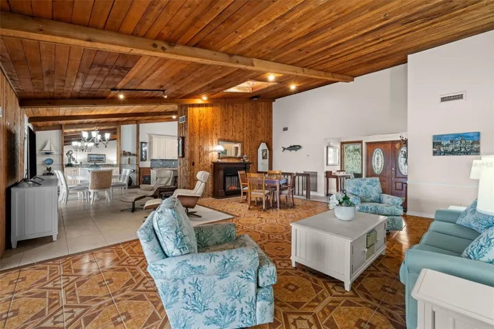 Large open living area with warm natural wood details