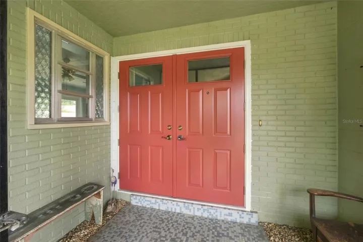 Spacious screened front porch area