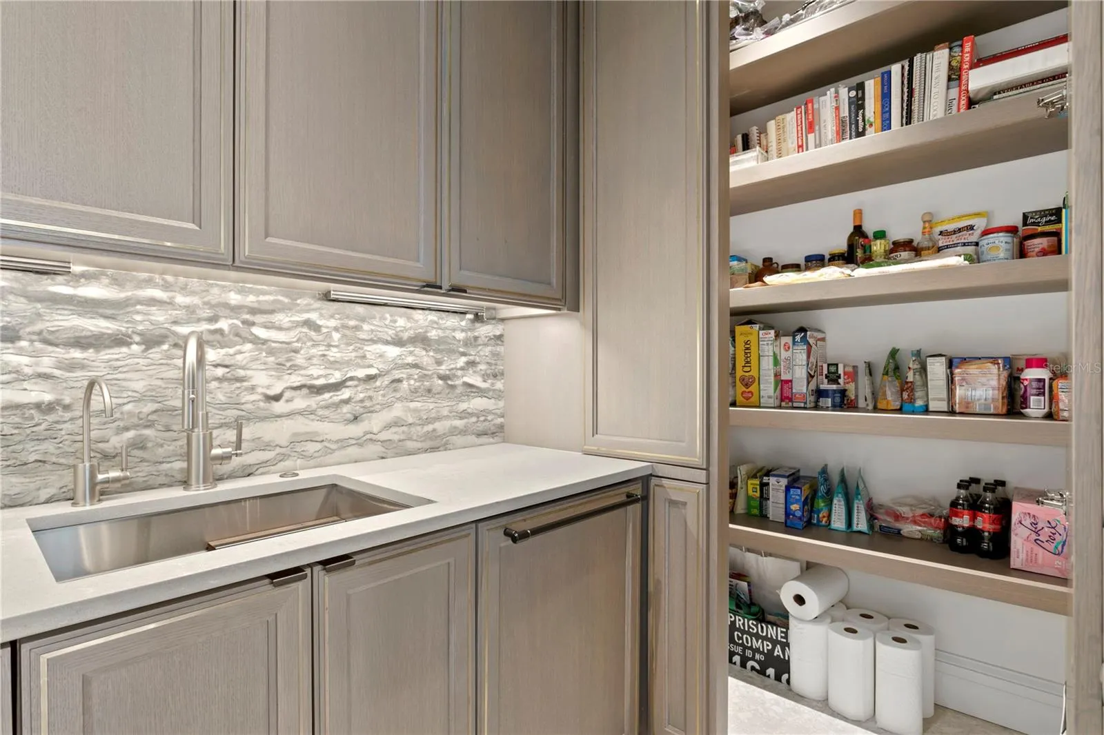 Spacious hidden walk-in pantry