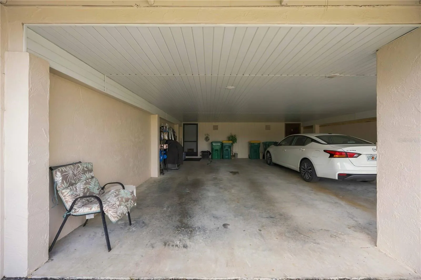 carport with large storage unti, electric and plumbing