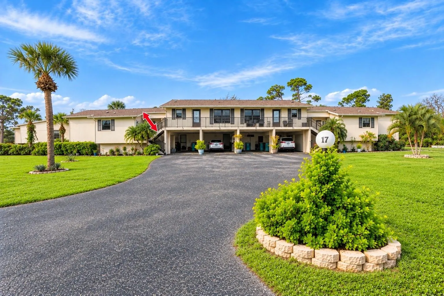 first level condo to the left of carport