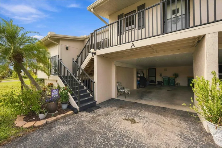 first level condo just above the carport, corner unit