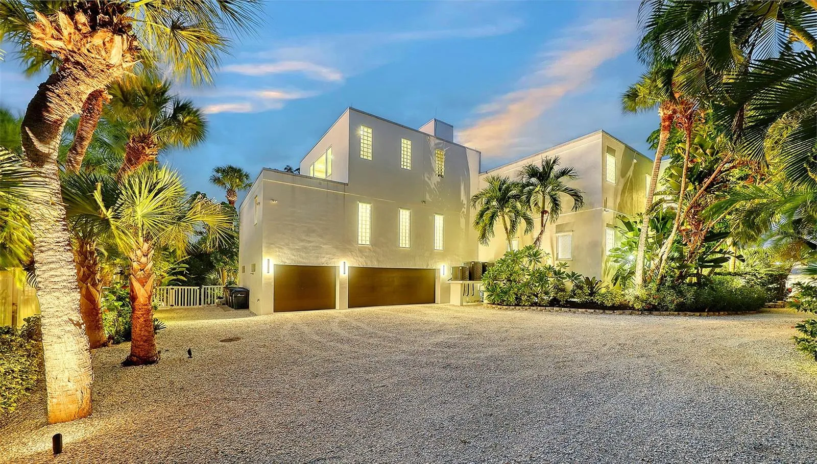Expansive motor court and 3 car garage