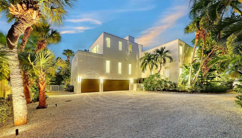 Expansive motor court and 3 car garage