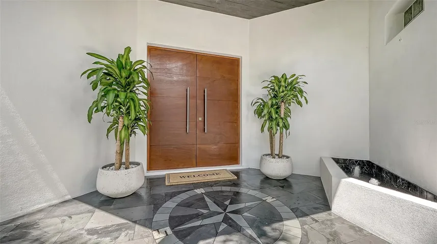 A marble compass entry leads the way