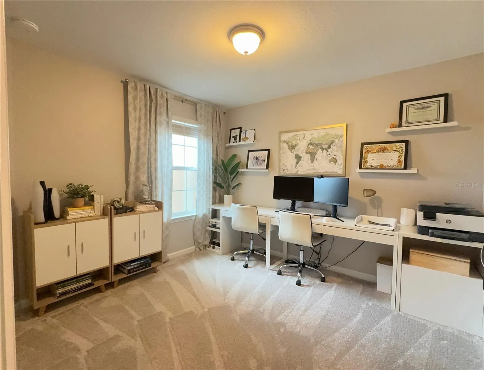 Second bedroom is being used as a dual office