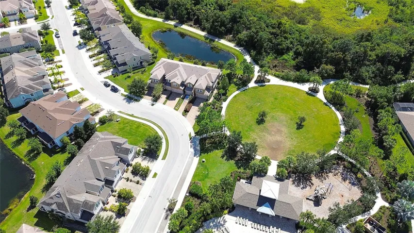 Aerial view of open space near townhome