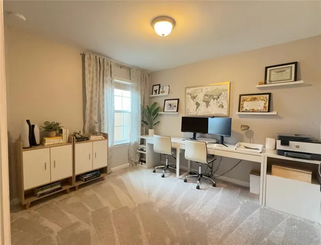 Second bedroom is being used as a dual office