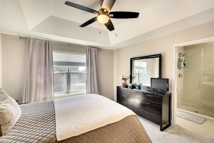 Primary bedroom with lots of natural light