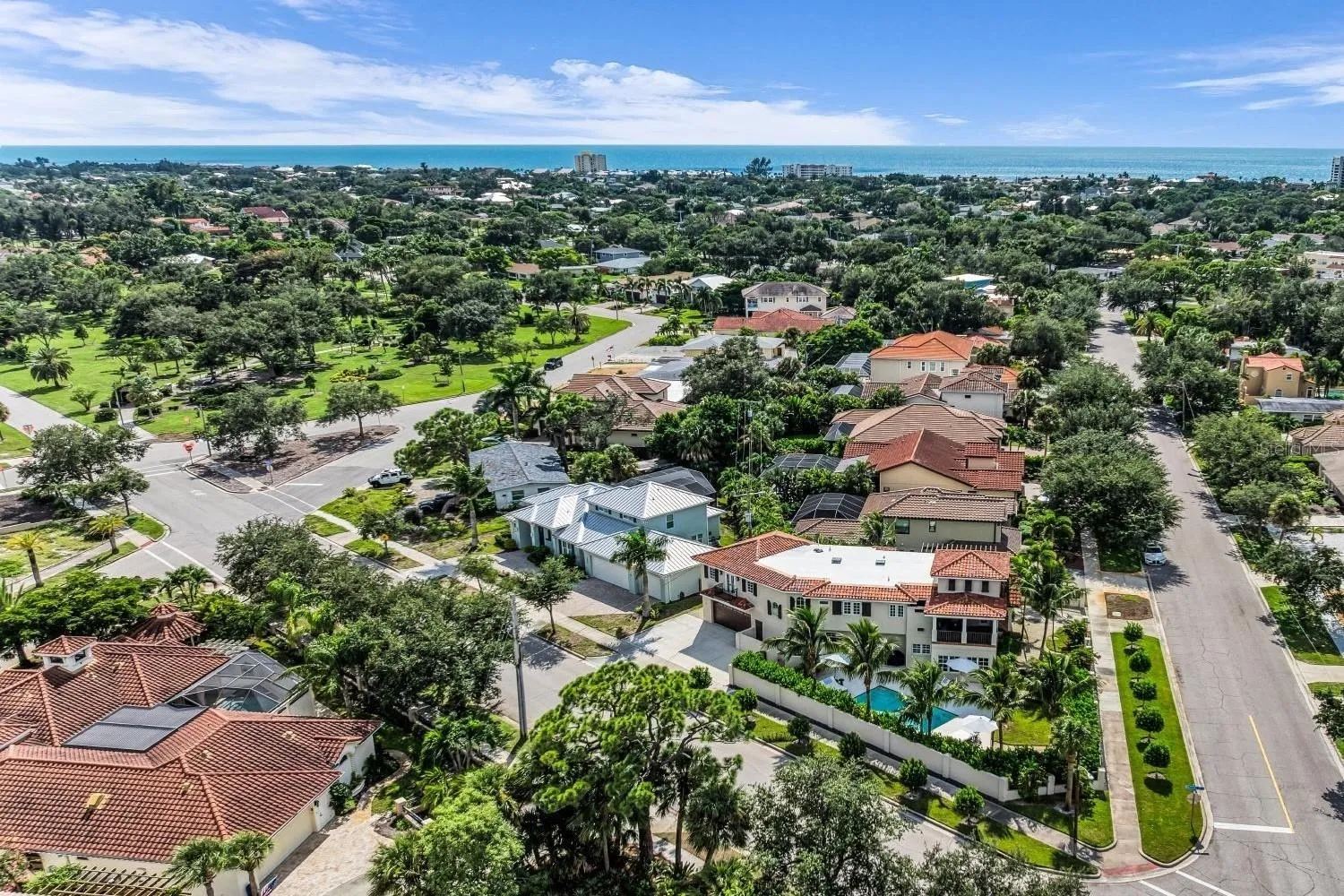 A great birds eye view of the home from the east side. Just one mile from the beautiful Gulf beaches and only a couple blocks from the charm of Historic Downtown Venice. Also, you can see here on the left side of the photo and one block from the house beautiful West Blalock Park, which includes the Monty Andrews Arboretum, sidewalks, shade trees, a small playground, butterfly garden and a gazebo.