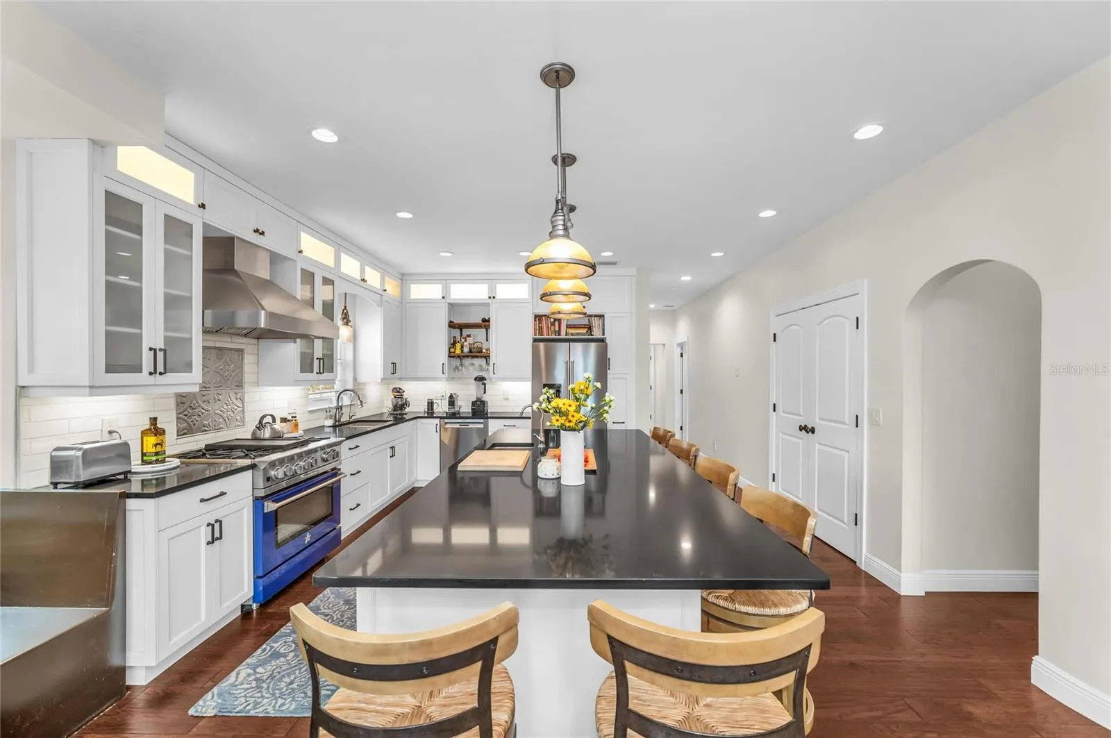 Lot's of light in the beautiful kitchen, windows and lighting.