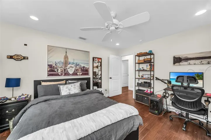 Spacious Bedroom on second level with view of coconut palm.