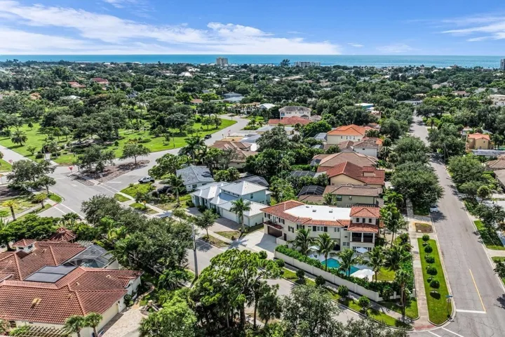 A great birds eye view of the home from the east side. Just one mile from the beautiful Gulf beaches and only a couple blocks from the charm of Historic Downtown Venice. Also, you can see here on the left side of the photo and one block from the house beautiful West Blalock Park, which includes the Monty Andrews Arboretum, sidewalks, shade trees, a small playground, butterfly garden and a gazebo.