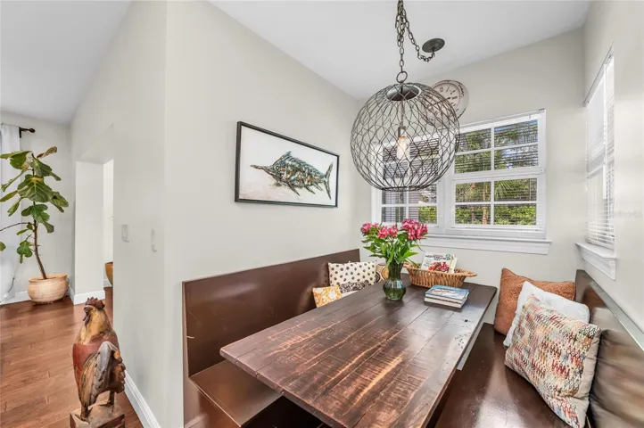 The restaurant-style built-in booth creates a unique space for casual dining or gathering with family and friends