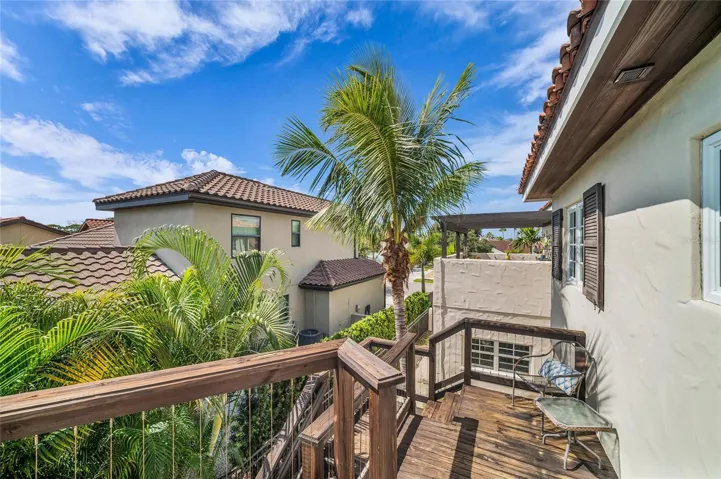 Outdoor sitting area and steps from private entrance/exit of apartment.
