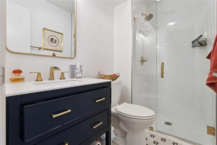 Bath off of the kitchen and family room.