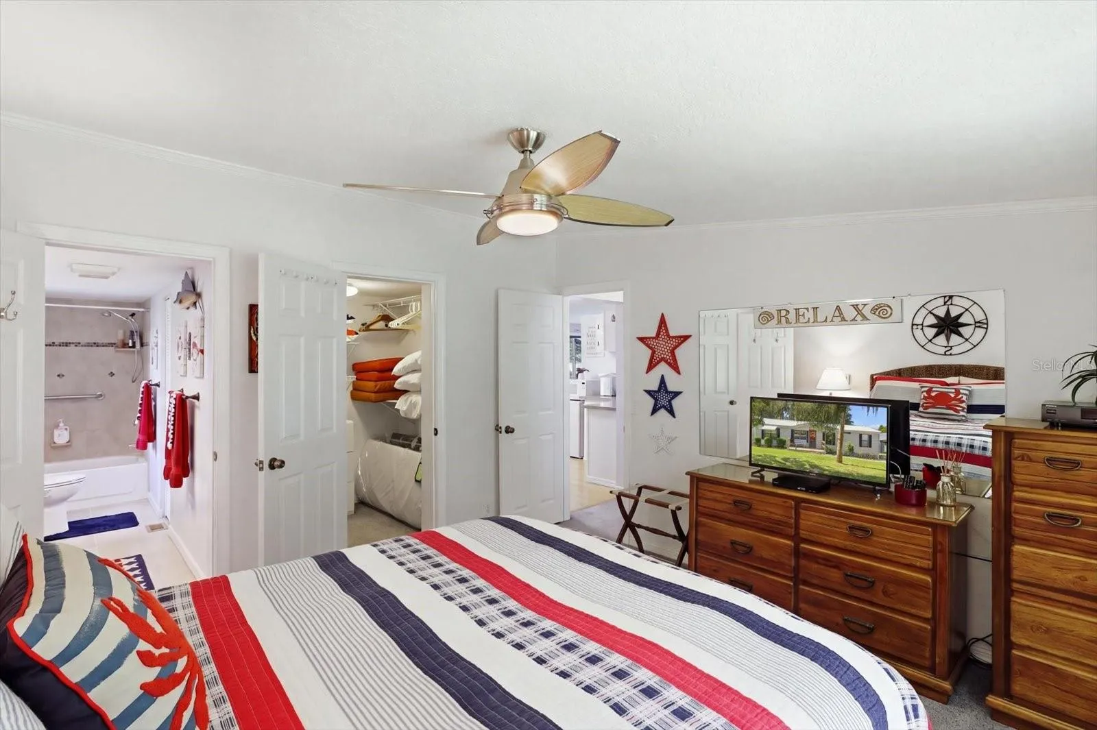 Primary Bedroom Suite, large walk-in closet, and ensuite bathroom