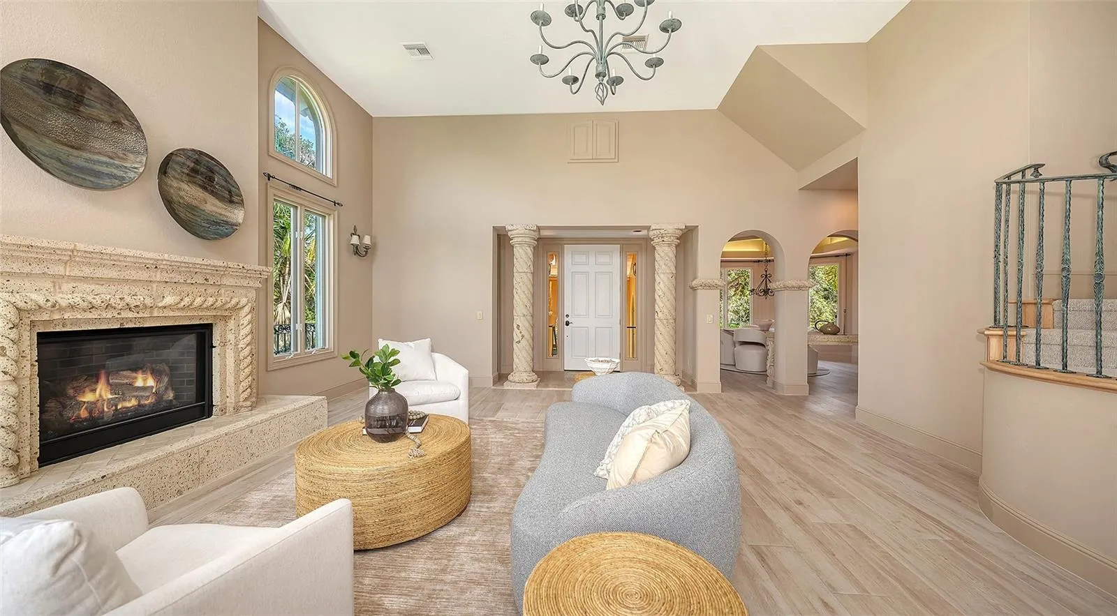 A fireplace, custom millwork and graceful architectural elements bring warmth and character to the main living area.