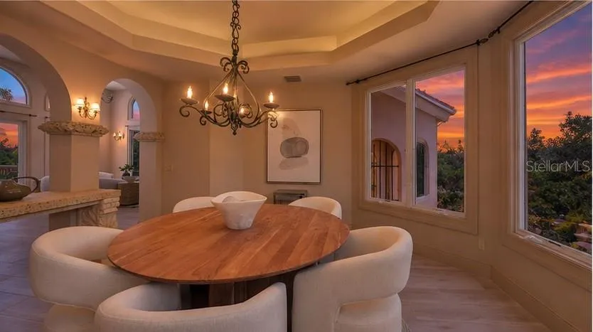 Enjoy unforgettable Florida sunsets from the elegance and comfort of the formal dining room.