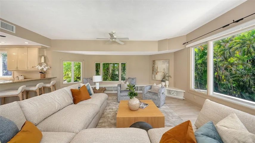 A spacious family room provides an inviting setting for everyday living while maintaining the home's sophisticated character.