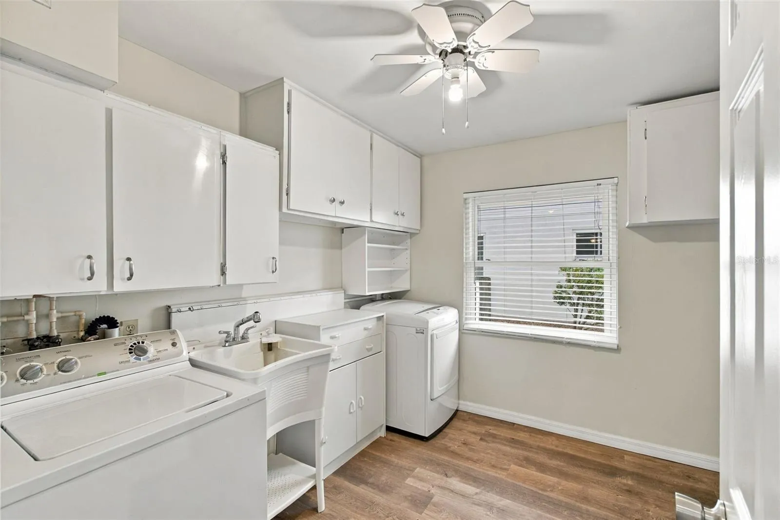 laundry room with extra storage