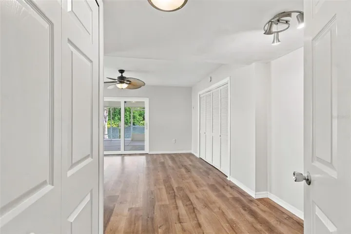 primary bedroom, sliders to screened porch