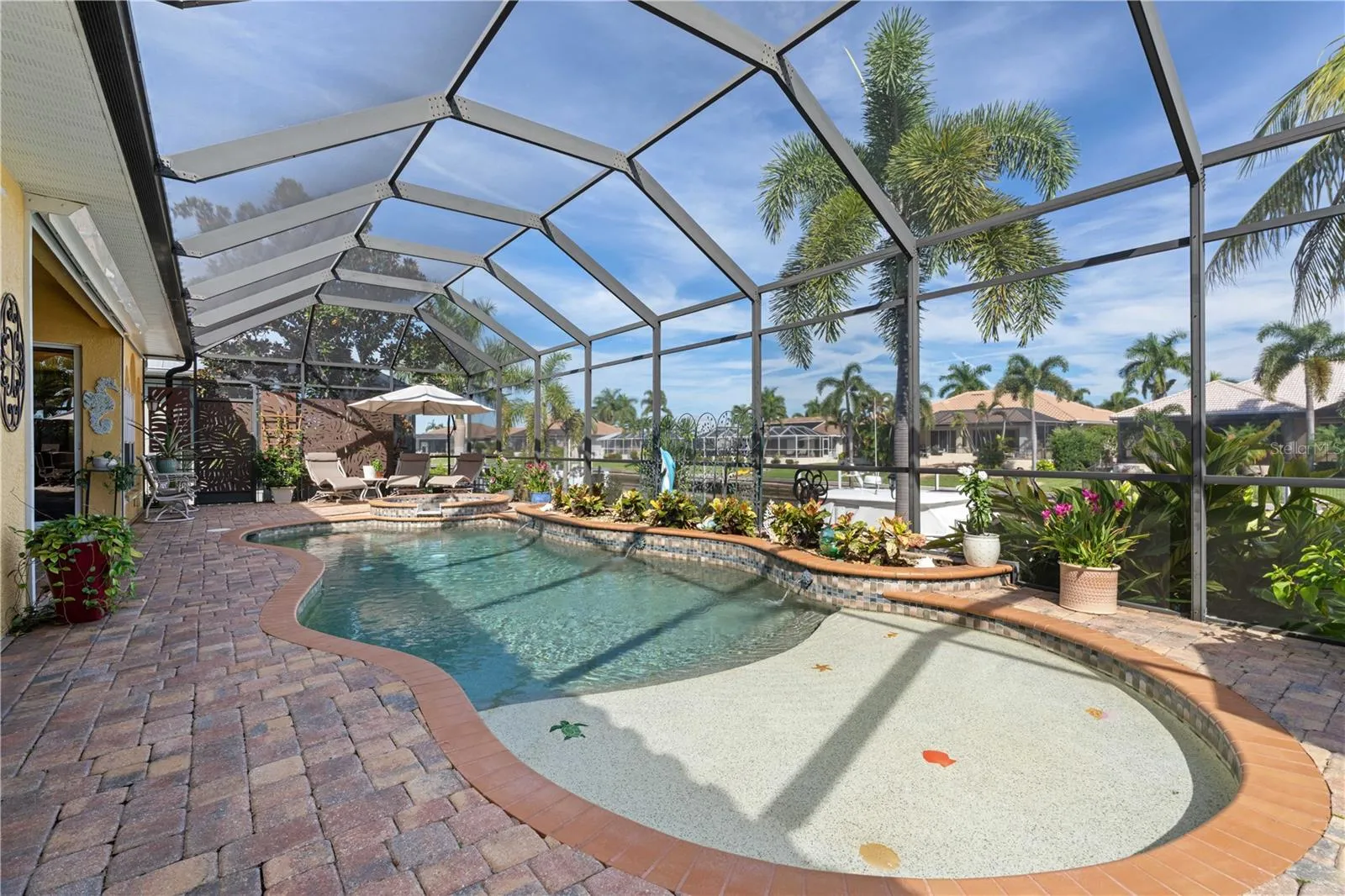 Tanning/sun shelf connected to in-ground, heated pool