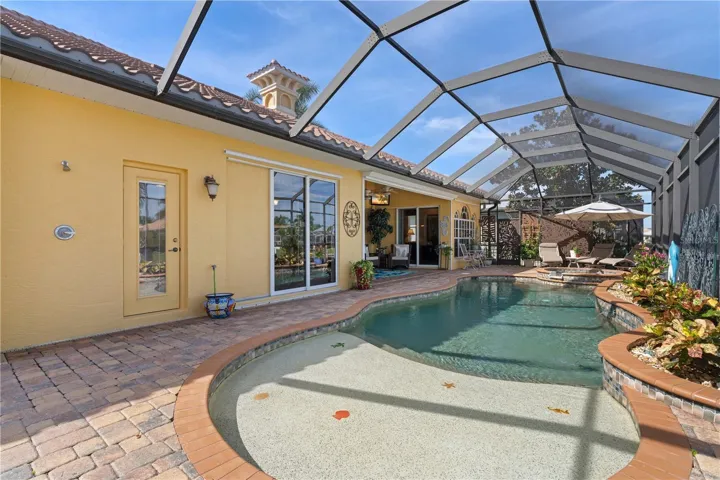 Outdoor shower next to pool