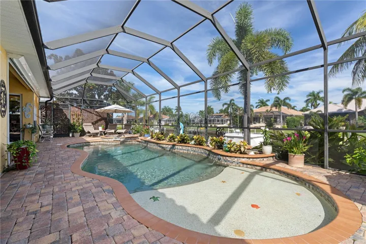 Tanning/sun shelf connected to in-ground, heated pool