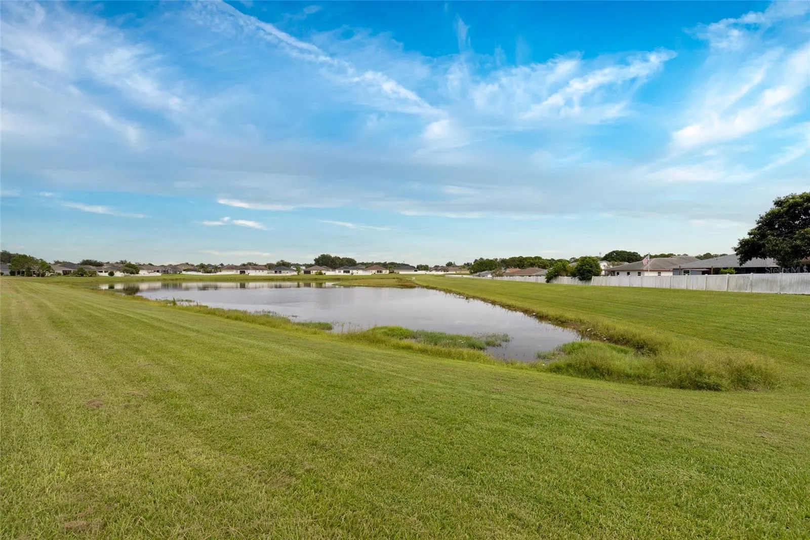 View Of Backyard Pond &amp;  Beautiful Skyview
