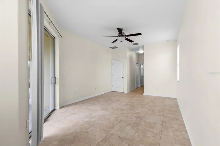 View Of Primary Bedroom From Reading Nook